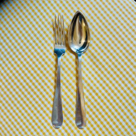 Set of 12 table spoons and 12 table forks in silver